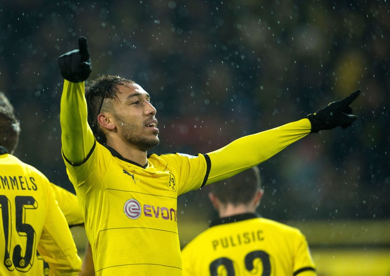 epa05135355 Dortmund's Pierre-Emerick Aubameyang celebrates after his goal at 1:0 during the German Bundesliga football match between Boussia Dortmund and FC Ingolstadt 04 at the Signal Iduna Park in Dortmund, Germany, 30 January 2016. (EMBARGO CONDITIONS - ATTENTION: Due to the accreditation guidelines, the DFL only permits the publication and utilisation of up to 15 pictures per match on the internet and in online media during the match.) EPA/BERND THISSEN