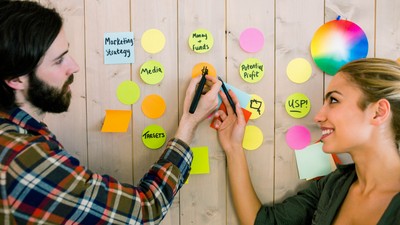 47446018 - creative team discussing new ideas in casual office