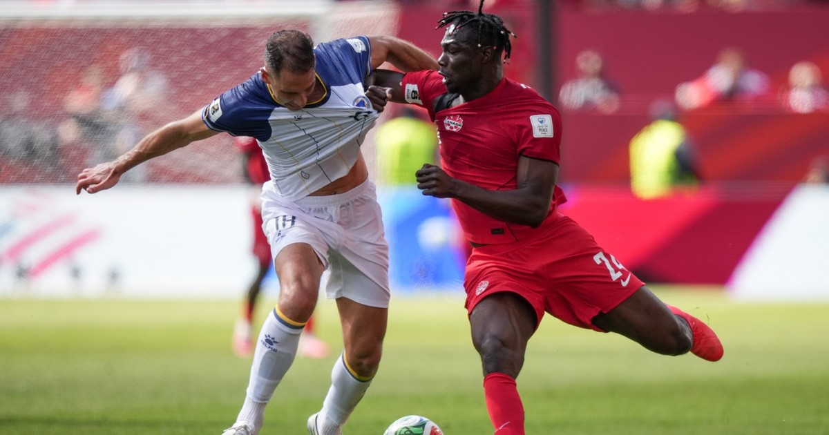 Echipa națională a Canadei a obținut primul punct din istoria sa la un turneu final de Cupă Mondială, după ce a remizat pe teren propriu, scor 1-1, în fața reprezentativei Bosniei, în Grupa B.