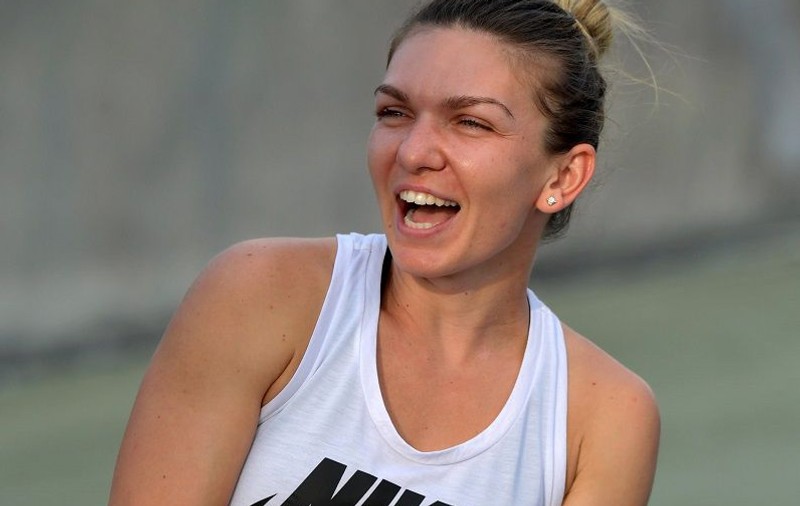 FOTO | Simona Halep şi Smiley au fost surprinşi împreună. Se distrează departe de România