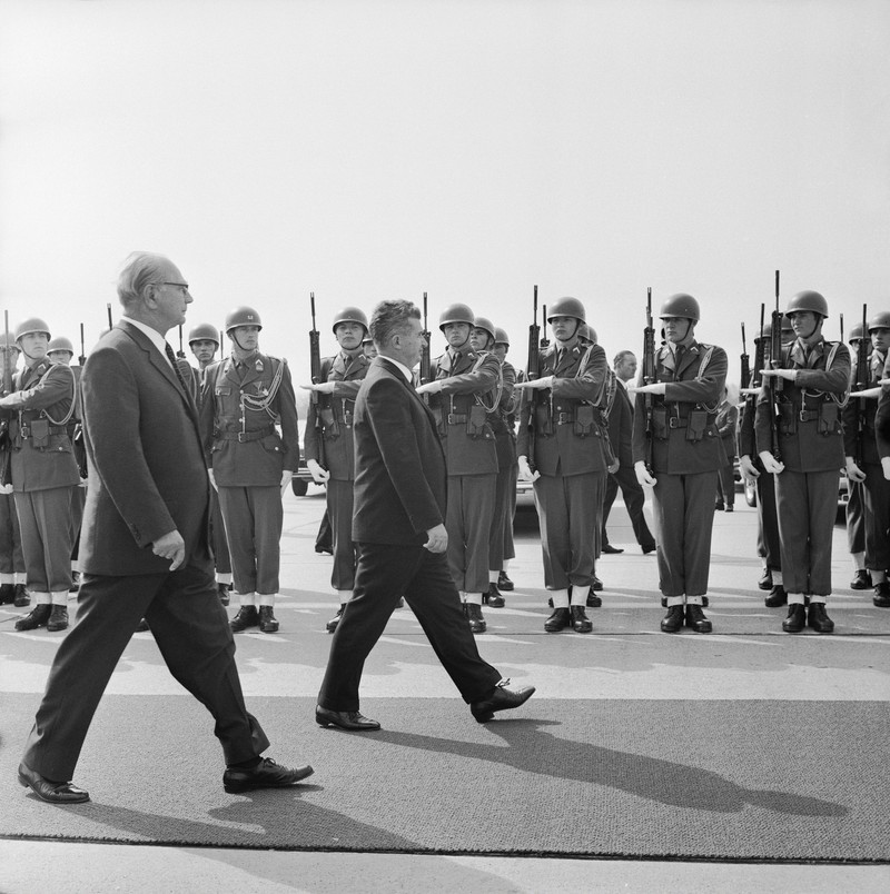 Nicolae Ceausescu, Romanian President, and Franz Jonas, Austrian Federal President, pacing off the honorary company on the occasion of the state visit. Photograph. 1970.,Image: 156458887, License: Rights-managed, Restrictions: , Model Release: no