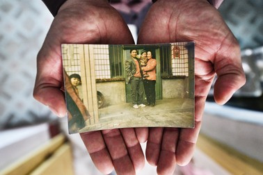 Guo Gangtang, fiul lui și soția, înainte ca băiețelul să fie răpit. Foto:China Report ASEAN