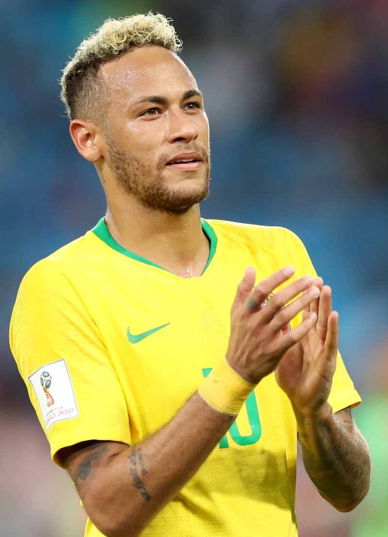 epa06845854 Neymar of Brazil celebrates at the end of the FIFA World Cup 2018 group E preliminary round soccer match between Serbia and Brazil in Moscow, Russia, 27 June 2018. Brazil won 2-0. (RESTRICTIONS APPLY: Editorial Use Only, not used in association with any commercial entity - Images must not be used in any form of alert service or push service of any kind including via mobile alert services, downloads to mobile devices or MMS messaging - Images must appear as still images and must not emulate match action video footage - No alteration is made to, and no text or image is superimposed over, any published image which: (a) intentionally obscures or removes a sponsor identification image; or (b) adds or overlays the commercial identification of any third party which is not officially associated with the FIFA World Cup) EPA-EFE/MAHMOUD KHALED EDITORIAL USE ONLY