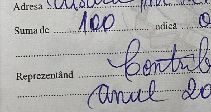 Pe chitanța tăiată de Viorel Olaru se vede un „50” sub „100" din chitanța ce rămânea credincioșilor.