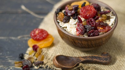 Oatmeal, dried fruits and pottery. An ideal breakfast. Healthy