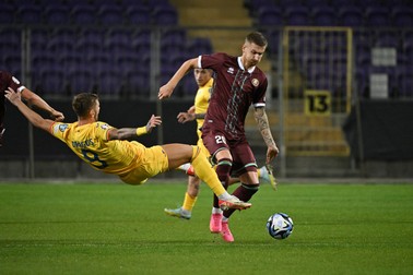 Belarus' defender #20 Zakhar Volkov (R) vies with Romania's forward #09 Denis Dragus during the UEFA Euro 2024 group I qualification football match Belarus v Romania at the Szusza Ferenc stadium of Budapest, Hungary on October 12, 2023.,Image: 813245831, License: Rights-managed, Restrictions: , Model Release: no