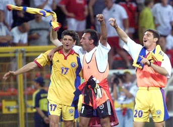 CHR42-20000620-CHARLEROI, BELGIUM: Romanian defender Miodrag Belodedici (L), substitute goalkeeper Florian Prunea (C) and Catalin Hildan celebrate their victory after the Euro 2000 group A soccer match between England and Romania in Charleroi on Tuesday 20 June 2000. Romania won 3-2. (ELECTRONIC IMAGE) EPA PHOTO /PASCAL GEORGE