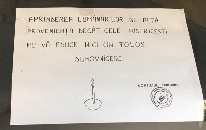 Afiș la o biserică din Năvodari: ”Lumânările de altă proveniență nu vă aduc niciun folos duhovnicesc”. Reacția Arhiepiscopiei: ”Să-L procurăm pe Hristos de la El acasă, nu de la mall”