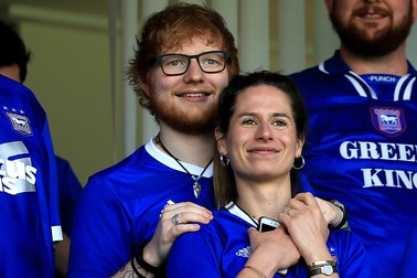 IPSWICH, ENGLAND - APRIL 21: Musician Ed Sheeran and fiance Cherry Seaborn look on during the Sky Bet Championship match between Ipswich Town and Aston Villa at Portman Road on April 21, 2018 in Ipswich, England. (Photo by Stephen Pond/Getty Images)