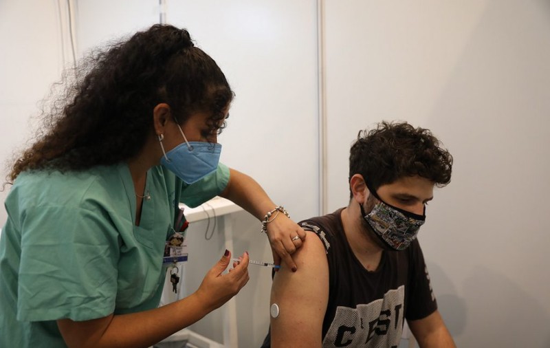 Excursii acasă de jumătate de oră. „Portița” prin care mii de israelieni din străinătate au reușit să se vaccineze anti-COVID
