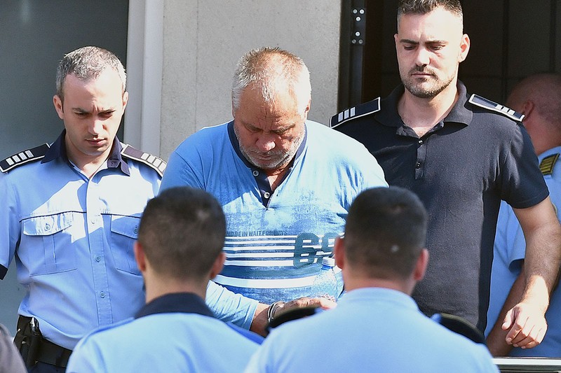 Gheorghe Dincă, în momentul în care a fost dus la Curtea de Apel Craiova | Foto: Hepta
