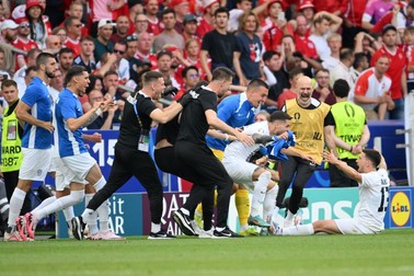 STUTTGART, GERMANY - JUNE 16: Erik Janza (13) of Slovenia celebrate with his teammates after scoring a goal during the 2024 European Football Championship (EURO 2024) Group C football match between Slovenia and Denmark at Mercedes-benz Arena in Stuttgart, Germany on June 16, 2024. Gokhan Balci / Anadolu/ABACAPRESS.COM