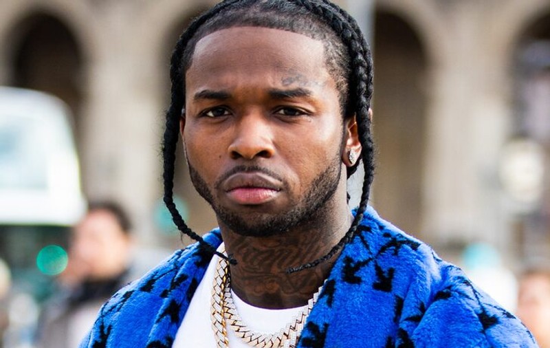 Un rapper american a fost împușcat mortal în propria casă, în urma unui jaf armat