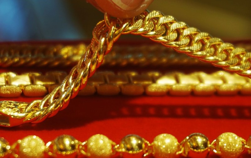 Prețul aurului, la un nou record din cauza temerilor unui război comercial SUA-China