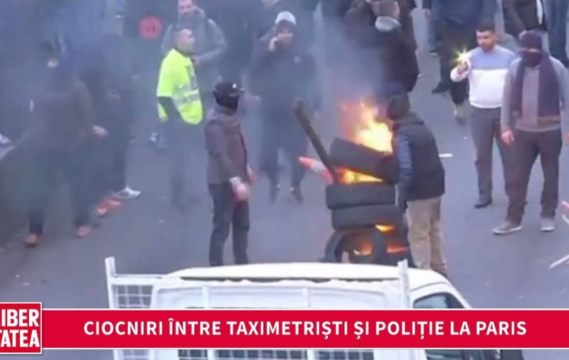 Proteste violente în Paris. Taximetriștii au incendiat cauciucuri în mijlocul străzii| VIDEO