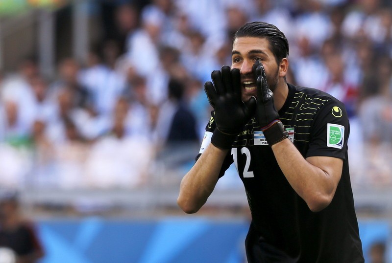 epa04271183 Goalkeeper Alireza Haghighi of Iran reacts during the FIFA World Cup 2014 group F preliminary round match between Argentina and Iran at the Estadio Mineirao in Belo Horizonte, Brazil, 21 June 2014. (RESTRICTIONS APPLY: Editorial Use Only, not used in association with any commercial entity - Images must not be used in any form of alert service or push service of any kind including via mobile alert services, downloads to mobile devices or MMS messaging - Images must appear as still images and must not emulate match action video footage - No alteration is made to, and no text or image is superimposed over, any published image which: (a) intentionally obscures or removes a sponsor identification image; or (b) adds or overlays the commercial identification of any third party which is not officially associated with the FIFA World Cup) EPA/FELIPE TRUEBA EDITORIAL USE ONLY
