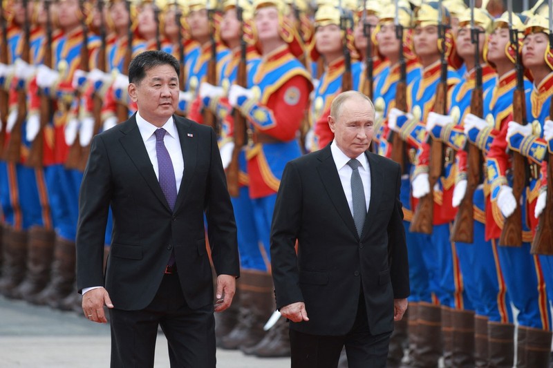 Russia's President Vladimir Putin (R) reviews an honour guard with Mongolia's President Ukhnaagiin Khurelsukh during an official welcoming ceremony in Ulaanbaatar, the capital of Mongolia on September 3, 2024.,Image: 904338373, License: Rights-managed, Restrictions: , Model Release: no