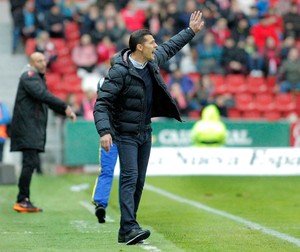 epa05184292 RCD Espanyol's Rumanian head coach Constantin Galca reacts during the Spanish Liga Primera Division soccer match against Sporting Gijon played at El Molinon stadium in Gijon, northern Spain, 27 February 2016. EPA/Alberto Morante