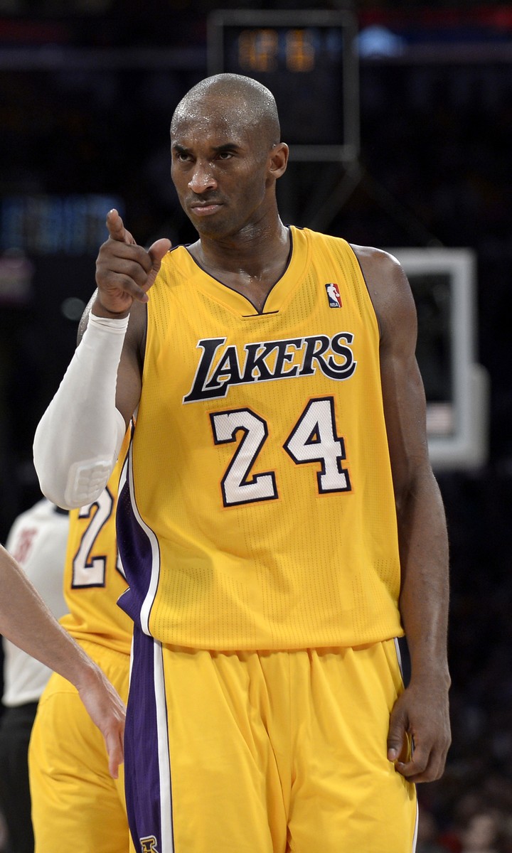 epa05048206 (FILE) A file photo dated 14 February 2013 shows Los Angeles Lakers Kobe Bryant reacting in the second half action of the Lakers' game against the Los Angeles Clippers, in Los Angeles, California, USA. US basketball legend Kobe Bryant of the Los Angeles Lakers on 29 November announced his plan to retire at the end of the current season. EPA/PAUL BUCK CORBIS OUT