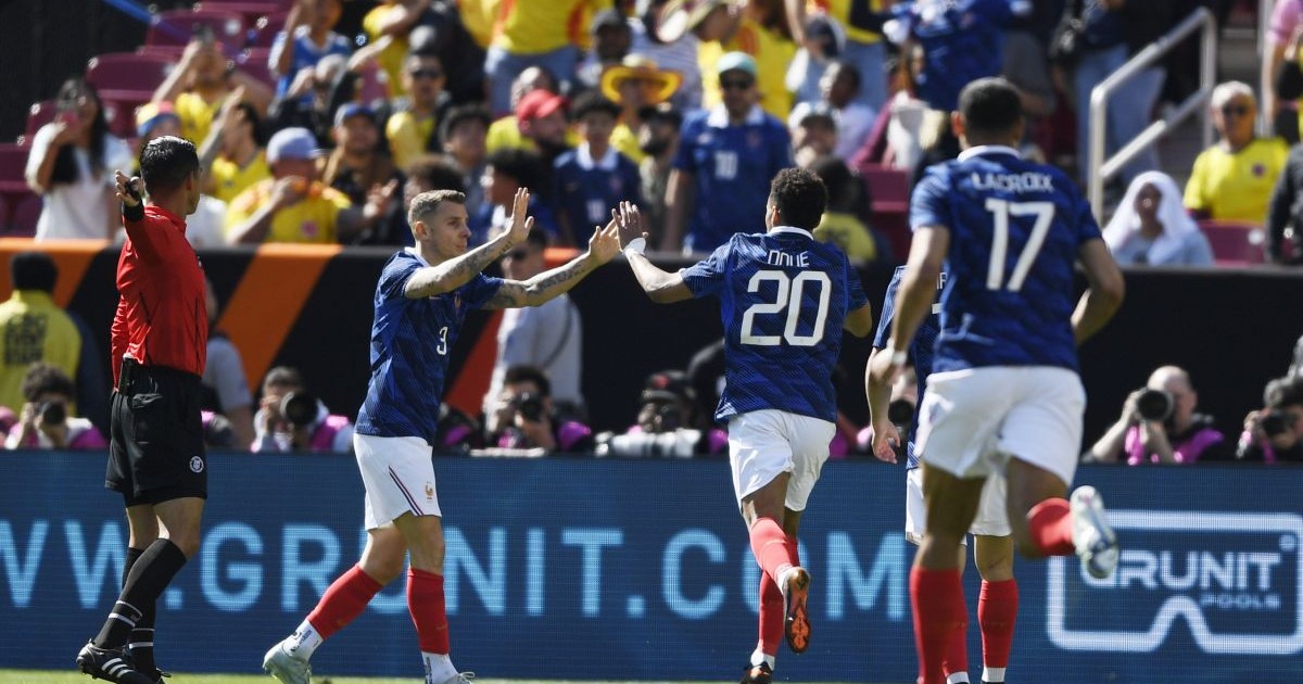 LANDOVER, MARYLAND - MARCH 29: Desire Doue of France celebrates scoring his team's first goal with teammate Lucas Digne during the international friendly match between Colombia and France at Northwest Stadium on March 29, 2026 in Landover, Maryland. (Photo by Hannah Foslien/Getty Images)