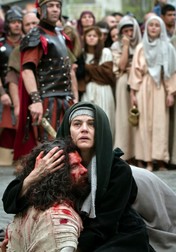 Romanian Jewish actress Maia Morgenstern, center, daughter of Holocaust survivors, best known for playing Mary in Mel Gibson's passion-stirring Biblical epic 'The Passion of the Christ" holds Dan Les during a reenactment of the crucifixion of Jesus Christ in Bucharest, Romania, Friday, April 13, 2012. Romania's orthodox majority will celebrate Easter on Sunday April 15.,Image: 592715274, License: Rights-managed, Restrictions: This content is intended for editorial use only. For other uses, additional clearances may be required., Model Release: no, Pictured: Mel Gibson