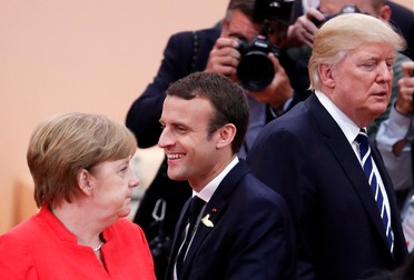 Angela Merkel, Emmanuel Macron și Donald Trump, la summitul G20 din iulie 2017 | Foto: EPA