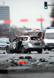 epa05212170 A damaged car on Bismarckstrasse in Berlin, Germany, 15 March 2016. The driver died when an explosion occurred in the vehicle while it was moving. EPA/PAUL ZINKEN