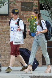 *PREMIUM-EXCLUSIVE* New York, NY - Ed Sheeran and his girlfriend, Cherry Seaborn, check out their hotel in New York City. The two are wearing O2 matching tees and Cherry carries some sunflowers. The Divine singer looks smitten with his childhood sweetheart as they head out together. Pictured: Ed Sheeran, Cherry Seaborn BACKGRID USA 4 JULY 2017 BYLINE MUST READ: INI / BACKGRID USA: +1 310 798 9111 / usasales@backgrid.com UK: +44 208 344 2007 / uksales@backgrid.com *UK Clients - Pictures Containing Children Please Pixelate Face Prior To Publication*
