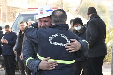 KAHRAMANMARAS, TURKIYE - FEBRUARY 14: Search and rescue team personnel embrace each other after rescuing 17-year-old Muhammed Enes Yeninar and his 21-year-old brother Abdulbaki Yeninar (not seen) by search and rescue teams from under rubble of a collapsed building 198 hours after 7.7 and 7.6 magnitude earthquakes hit Turkiye's Kahramanmaras, on February 14, 2023. On Feb. 06, a strong 7.7 earthquake, centered in the Pazarcik district, jolted Kahramanmaras and strongly shook several provinces, including Gaziantep, Sanliurfa, Diyarbakir, Adana, Adiyaman, Malatya, Osmaniye, Hatay, and Kilis. Later, at 13.24 p.m. (1024GMT), a 7.6 magnitude quake centered in Kahramanmaras' Elbistan district struck the region. Dogukan Keskinkilic / Anadolu Agency/ABACAPRESS.COM,Image: 755898683, License: Rights-managed, Restrictions: , Model Release: no