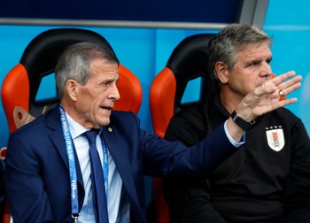 epa06809719 Oscar Tabarez (L), coach of Uruguay, reacts during the FIFA World Cup 2018 group A preliminary round soccer match between Egypt and Uruguay in Ekaterinburg, Russia, 15 June 2018. (RESTRICTIONS APPLY: Editorial Use Only, not used in association with any commercial entity - Images must not be used in any form of alert service or push service of any kind including via mobile alert services, downloads to mobile devices or MMS messaging - Images must appear as still images and must not emulate match action video footage - No alteration is made to, and no text or image is superimposed over, any published image which: (a) intentionally obscures or removes a sponsor identification image; or (b) adds or overlays the commercial identification of any third party which is not officially associated with the FIFA World Cup) EPA-EFE/FRANCIS R. MALASIG EDITORIAL USE ONLY
