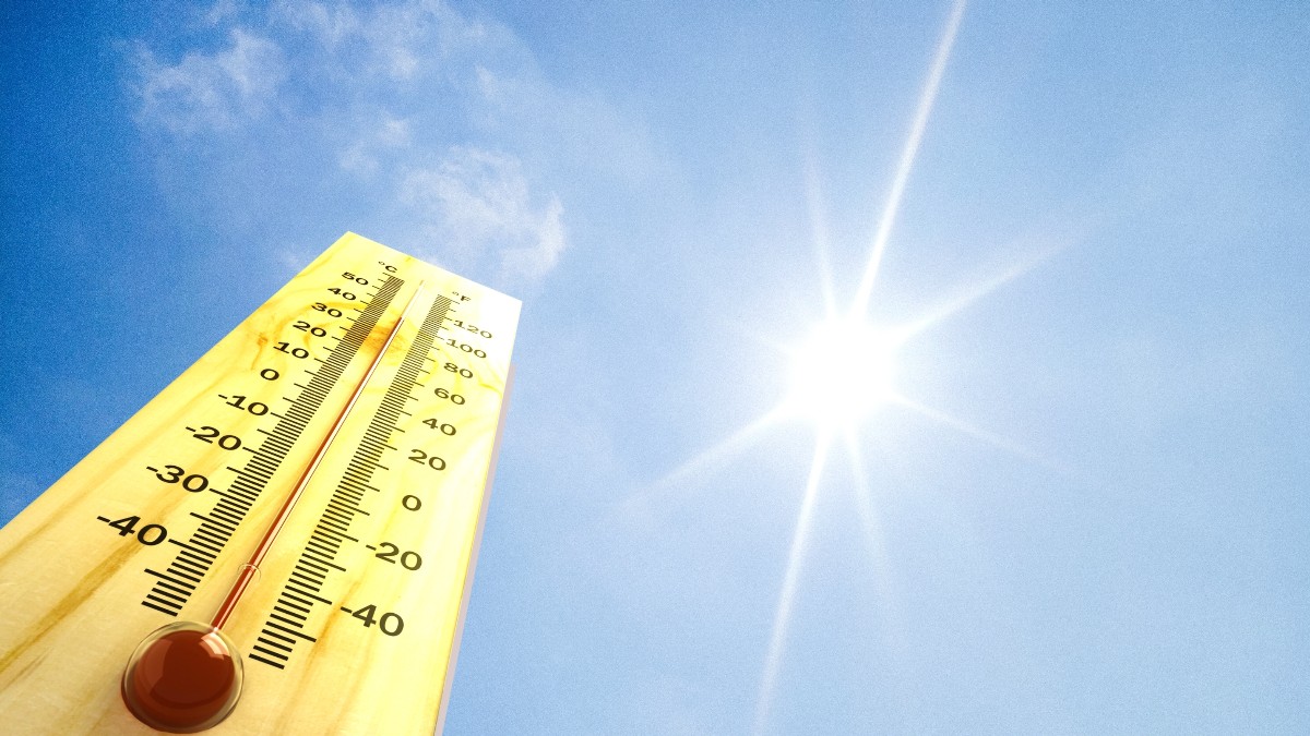 În stânga este un termometru. În partea dreaptă se vede Soarele