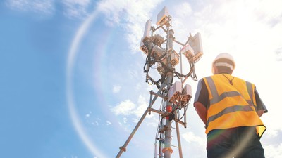 Helmeted,Asian,Male,Engineer,Works,In,The,Field,With,A