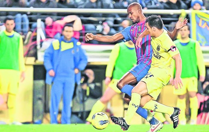 Barcelona i-a dedicat succesul cu Getafe, 4-0, fundaşului francez Eric Abidal, care a suferit marţi un transplant de ficat