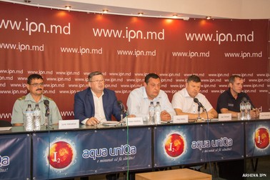 Tarlapan (al doilea din stânga), la conferința de presă IPN. Sursa: captura IPN