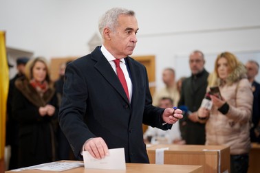Calin Georgescu, an independent candidate for president who came first after the first round of presidential elections, casts his vote in the country's parliamentary elections, in Mogosoaia, Romania, Sunday, Dec. 1, 2024.,Image: 941468847, License: Rights-managed, Restrictions: This content is intended for editorial use only. For other uses, additional clearances may be required., Model Release: no