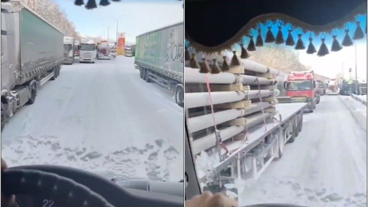 Fotografie dintr-o mașină, iar pe geam se vede aglomerație, multe TIR-uri stau pe șosea, iar pe jos este zăpadă, pe pe tronsonul dintre Kultuk și Vîdrino, autostrada Baikal, în Rusia, 1 decembrie 2025