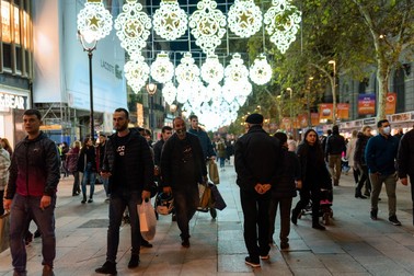 Tourists and shop goers walk at night under the Christmas lights in the city downtown in the main shopping street known as Carrer de l'Angel in Barcelona, Spain, on November 26, 2021.,Image: 645692721, License: Rights-managed, Restrictions: , Model Release: no, Credit line: Profimedia