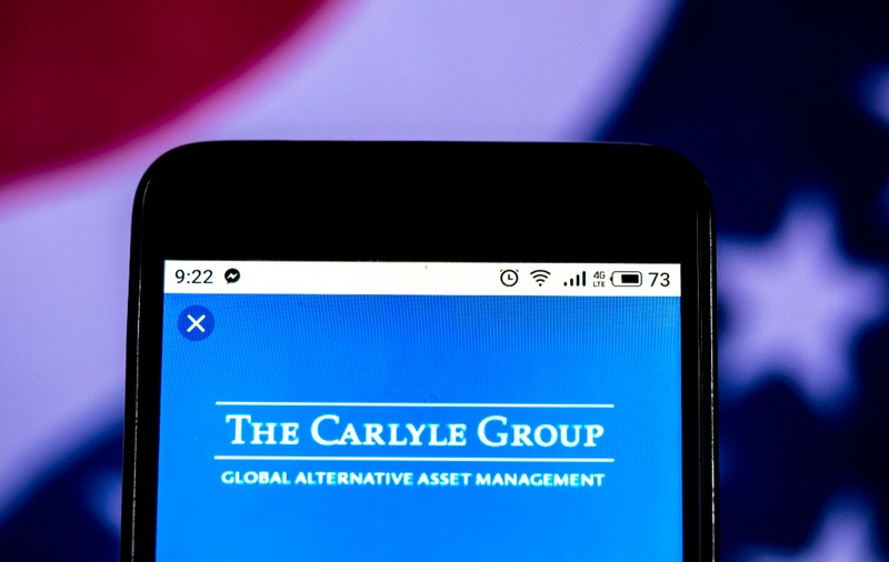 Cine este Carlyle Group și ce afaceri mai are în România compania care vrea să cumpere activele străine ale Lukoil