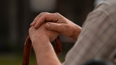side-view-old-man-sitting-bench