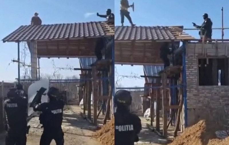 Un bărbat urcat pe un acoperiş, înarmat cu pietre şi cu o sabie, a atacat polițiștii în Argeș: „Frate, folosiţi arma că nu e de glumă!”
