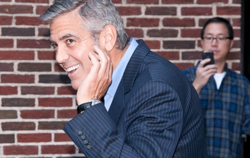 Berlusconi a încercat să-l ispitească pe George Clooney cu orgiile lui