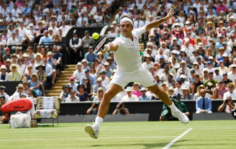 Roger Federer, în sferturi la Wimbledon. Premieră pentru John Isner