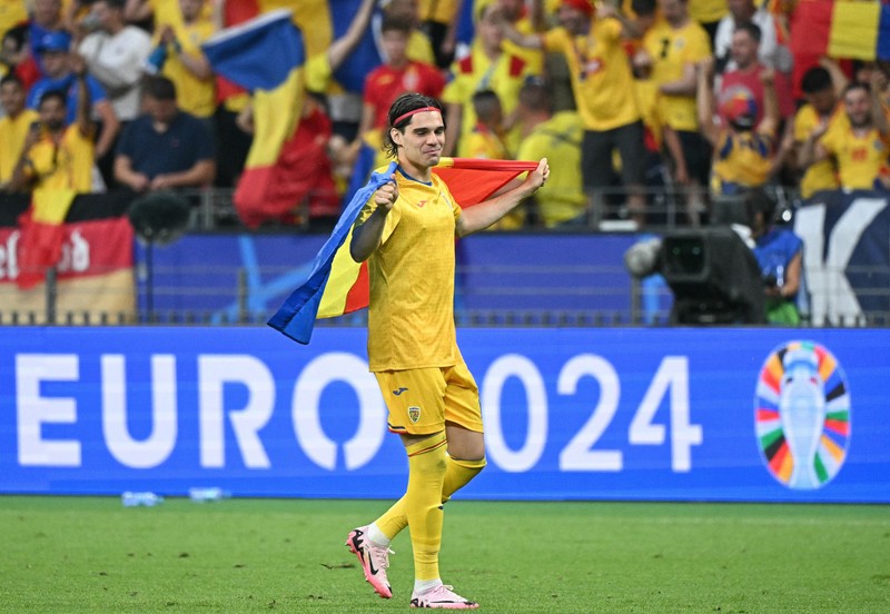 Romania's midfielder #10 Ianis Hagi celebrates on the pitch after the UEFA Euro 2024 Group E football match between Slovakia and Romania at the Frankfurt Arena in Frankfurt am Main on June 26, 2024.,Image: 884957573, License: Rights-managed, Restrictions: , Model Release: no