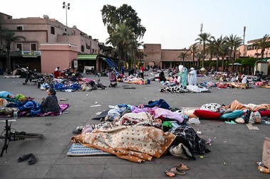 MARRAKESH, MOROCCO - SEPTEMBER 10: People sleep on a street following the powerful earthquake in Marrakesh, Morocco on September 10, 2023. Piero Cruciatti / Anadolu Agency,Image: 804322515, License: Rights-managed, Restrictions: , Model Release: no