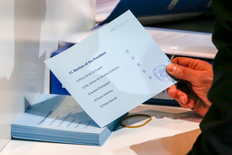 epa05181861 A notary holds a ballot paper with the names of the five candidates for FIFA President during the Extraordinary FIFA Congress 2016 held at the Hallenstadion in Zurich, Switzerland, 26 February 2016. The Extraordinary FIFA Congress is being held in order to vote on the proposals for amendments to the FIFA Statutes and choose the new FIFA President. EPA/PATRICK B. KRAEMER
