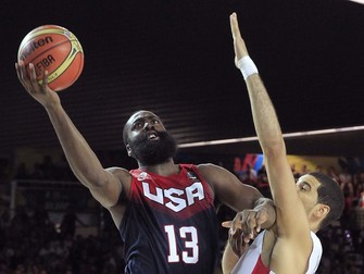 epa04383085 US player James Harden (L) goes to basket in opposition of Dominican Eloy Vargas (R) during their FIBA Basketball World Cup match Group C match played at the Bizkaia Arena (BEC) pavilion in Bilbao, northern Spain, 03 September 2014. EPA/ALFREDO ALDAI