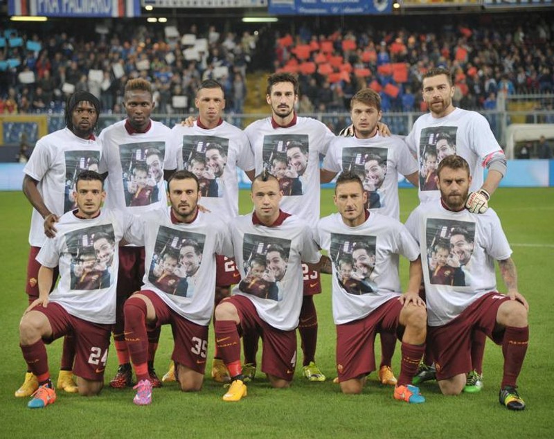 GALERIE FOTO / Victimele unui român, comemorate de un stadion întreg!