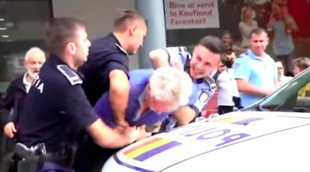 Polițiștii s-au chinuit îndelung să-l rețină pe bărbatul care nu voia să poarte mască
