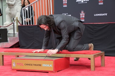 14 May 2019 - Hollywood, California - Keanu Reeves. Keanu Reeves Places His Hand Prints In Cement At TCL Chinese Theatre IMAX Forecourt. Photo Credit: PMA/AdMedia