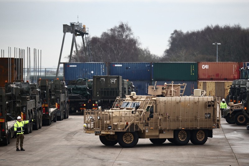 A Mastiff vehicle is prepared as military vehicles including trucks and support vehicles, are loaded onto the MV Hurst Point, at the Marchwood Military Sea Mounting Centre near Southampton, southern England, on January 16, 2025, as The Royal Scots Dragoon Guards and the 4th Battalion, The Royal Regiment of Scotland prepare to deploy to Romania on Exercise Steadfast Dart, NATO’s foremost military exercise of 2025. This major exercise will see the recently formed NATO Allied Reaction Force, of which the land component is commanded by the 1 (United Kingdom) Division, being tested to the full as it rolls out across Europe to take part in Ex Steadfast Dart in Romania, Bulgaria, and Greece.,Image: 954339762, License: Rights-managed, Restrictions: , Model Release: no
